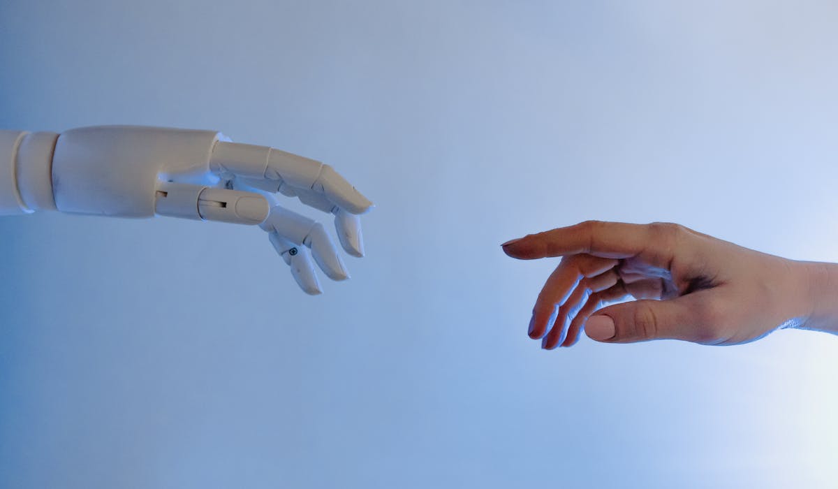 A person configuring an automation workflow connecting a chat app to an AI model on a screen